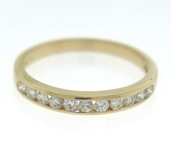 Elegant 14kt Yellow Gold Channel Set Diamond Band