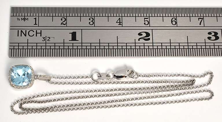 Chic Blue Topaz & Diamond Necklace in 14L WG