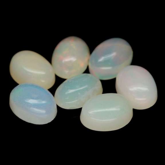 Beautiful 4.13ct unheated Ethiopian opal set