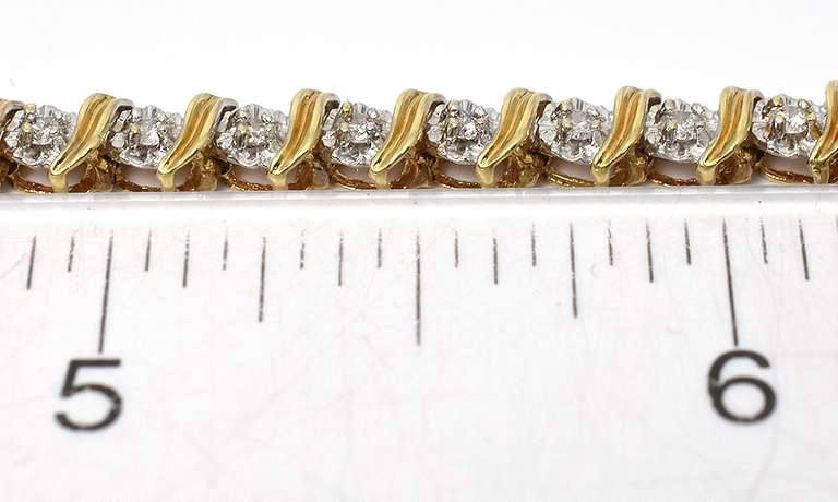 Dazzling Diamond Accent Tennis Bracelet in Yellow Gold
