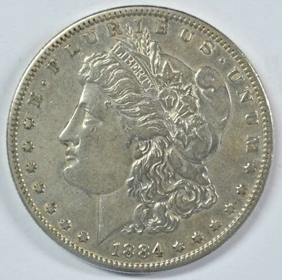 High grade 1884-S Morgan Silver Dollar. Cleaned AU