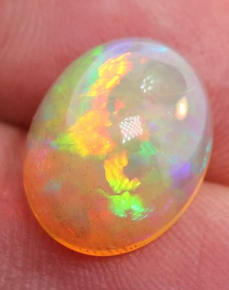 Phenomenal full spectrum flashing 4.68ct semi-black Opal