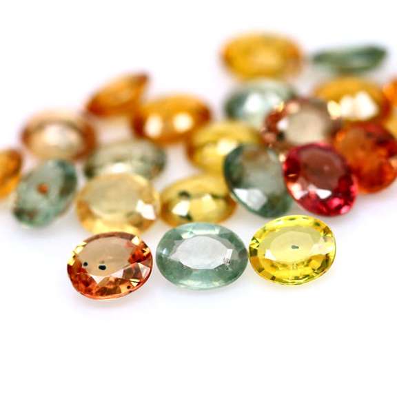 9.55ct heated only Autumn leave Sapphire set