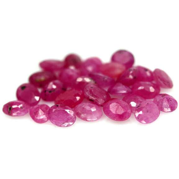 Heated only! 5.75ct violet red Ruby set