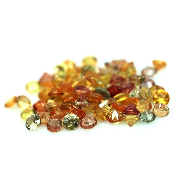 8.10ct heated only Autumn leave Sapphire set