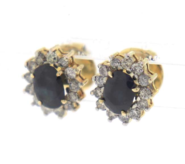 Pleasing Oval Sapphire and Diamond Halo Earrings