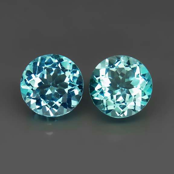 Eye clean 7.02ct round brilliant cut Topaz pair
