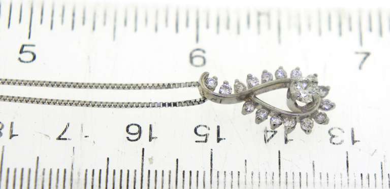 Twinkling 14kt White Gold Diamond Swirl Pendant on Chain Necklace