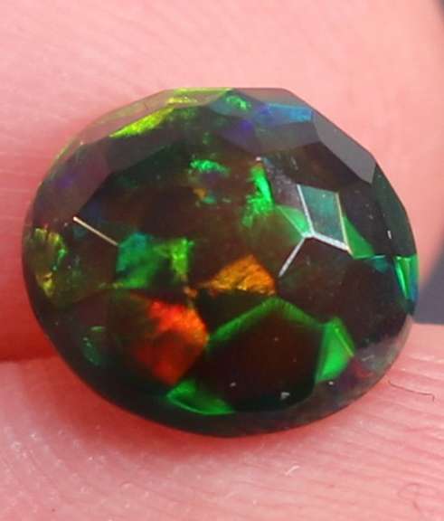 Vibrant 1.55ct ribbon pattern Black Opal solitaire