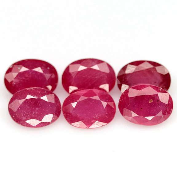 Heavy 9.50ct oval cut Ruby set