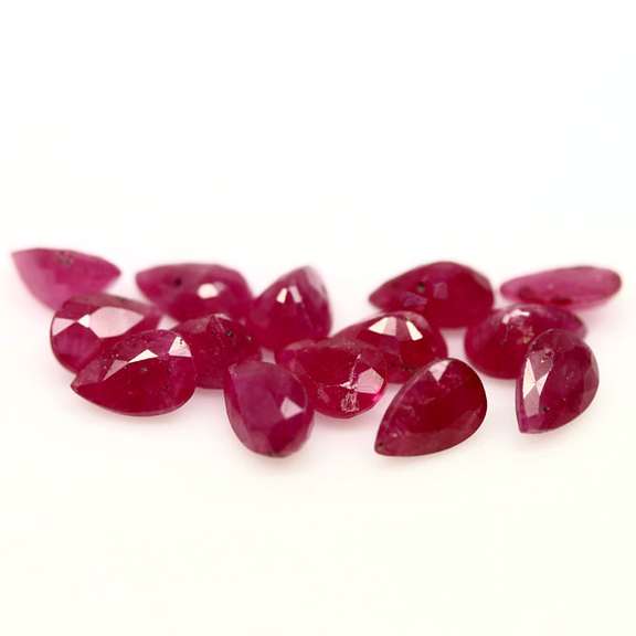 Heated only! 8.69ct violet red Ruby set