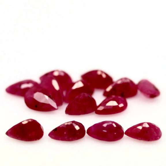 Heated only! 8.69ct violet red Ruby set