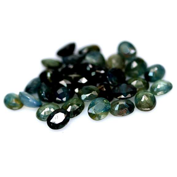 Heated only! 15.21ct blue green Sapphire set