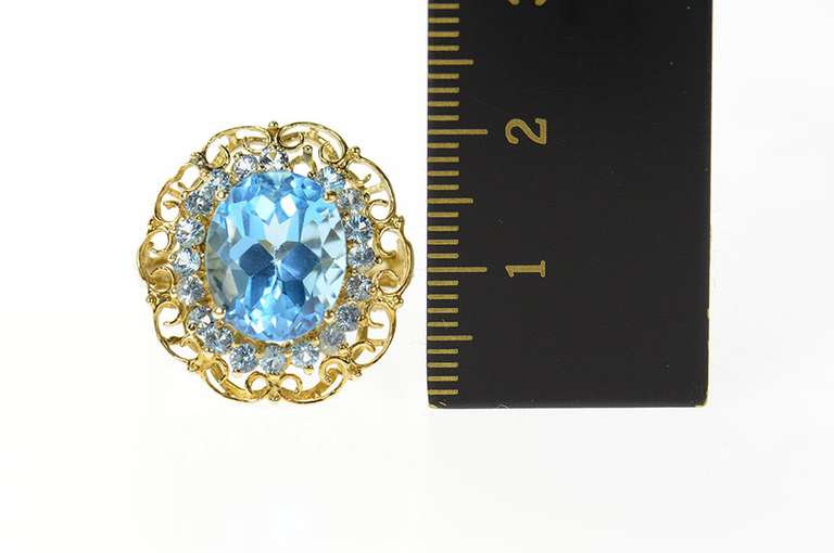 10K Yellow Gold Oval Blue Topaz Halo Filigree Cocktail Ring