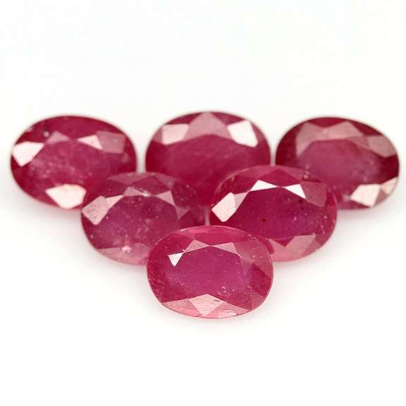 Heavy 9.50ct oval cut Ruby set