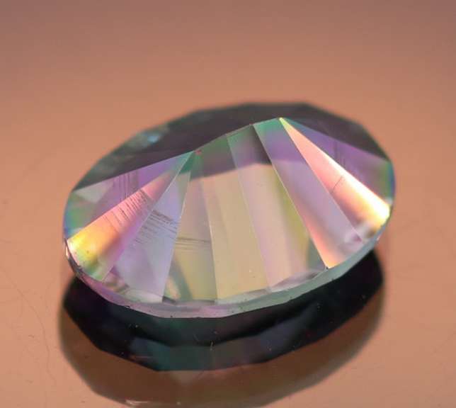 Rainbow color 7.31ct concave cut Mystic Quartz