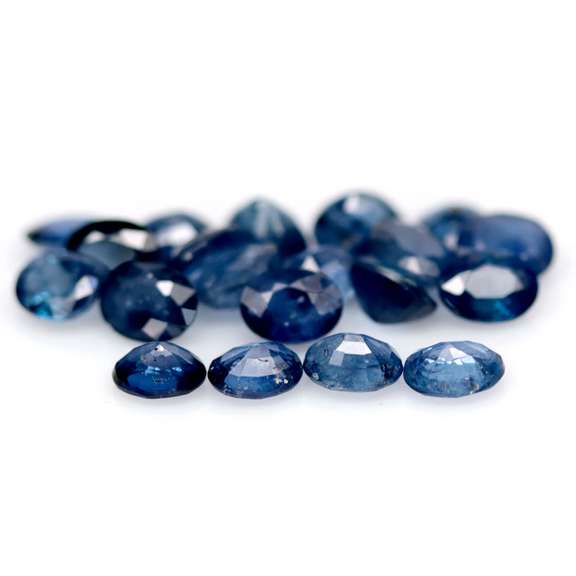 Stunning ink blue 10.82ct oval Sapphire set