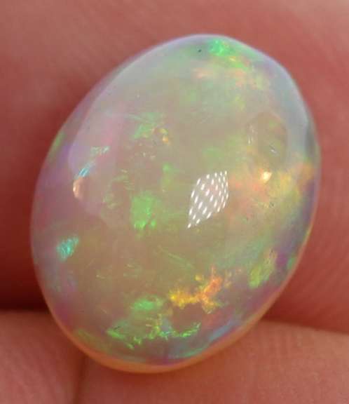 Stunning 4.63ct floral patterned semi-black Opal