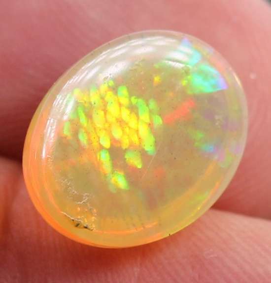 Phenomenal full spectrum flashing 4.68ct semi-black Opal