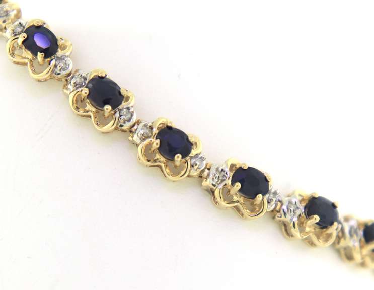 Stunning Blue Sapphire and Diamond Flower Tennis Bracelet