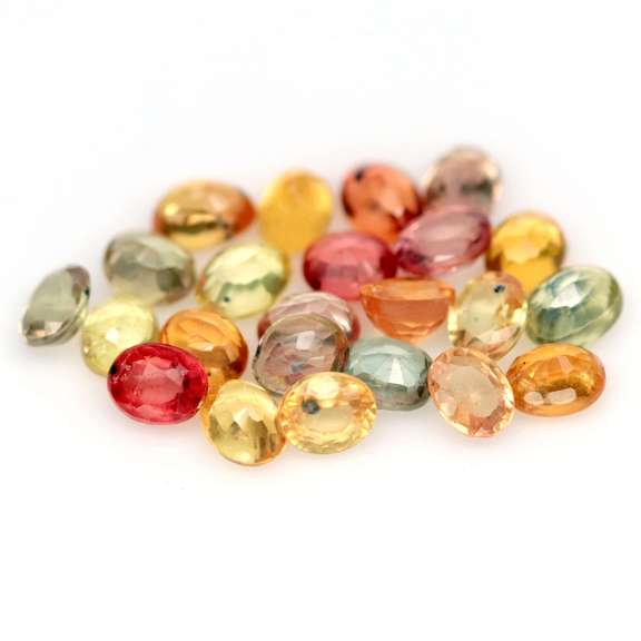 Heated only! 7.02ct fancy color Sapphire set