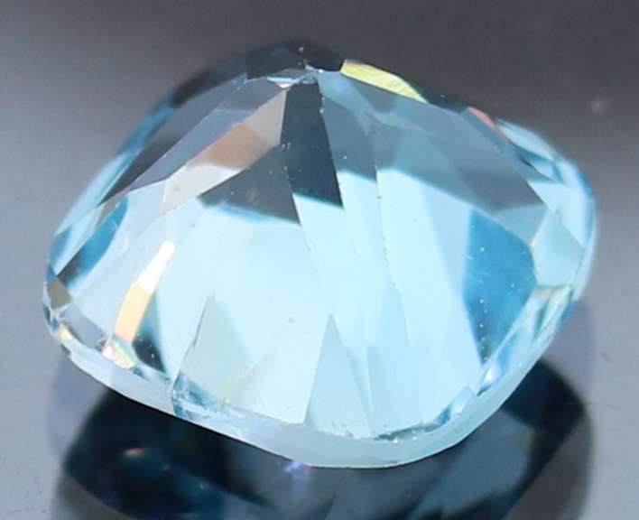 Vivid! 5.60ct cushion cut Swiss blue Topaz