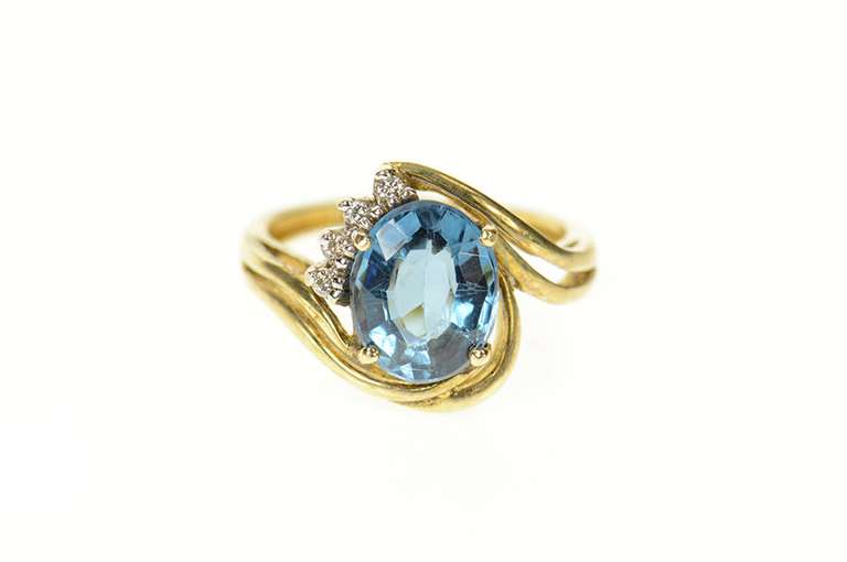 14K Yellow Gold Blue Topaz Diamond Accent Orante Bypass Ring