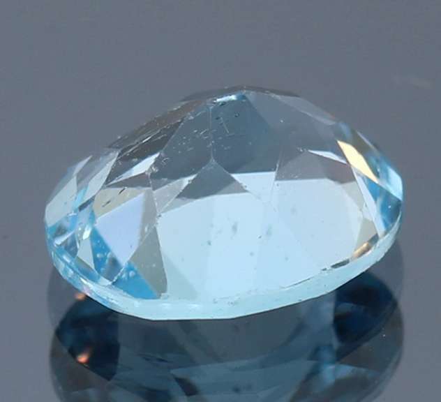 Simply stunning 6.09ct 10x12mm vivid sky blue Topaz