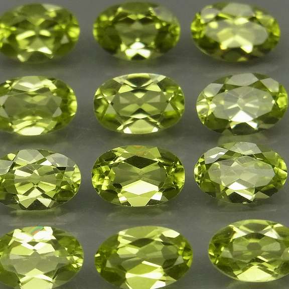 Dazzling 5.72ct untreated apple green Peridot set