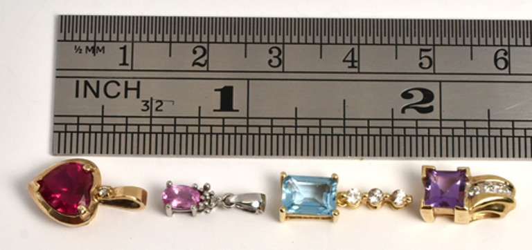 Group of 4 Colored Stone Pendants