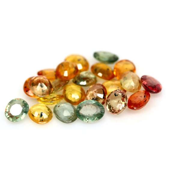 9.55ct heated only Autumn leave Sapphire set