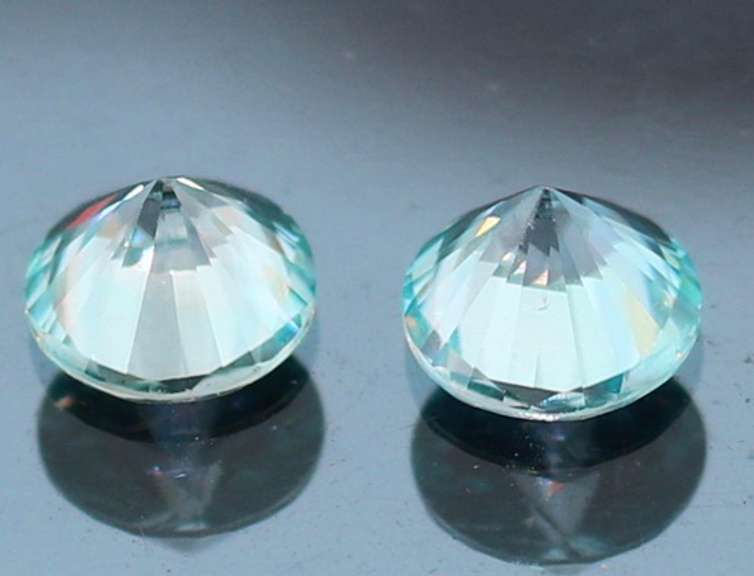 Highly prismatic! Concave cut 2.82ct Zircon set
