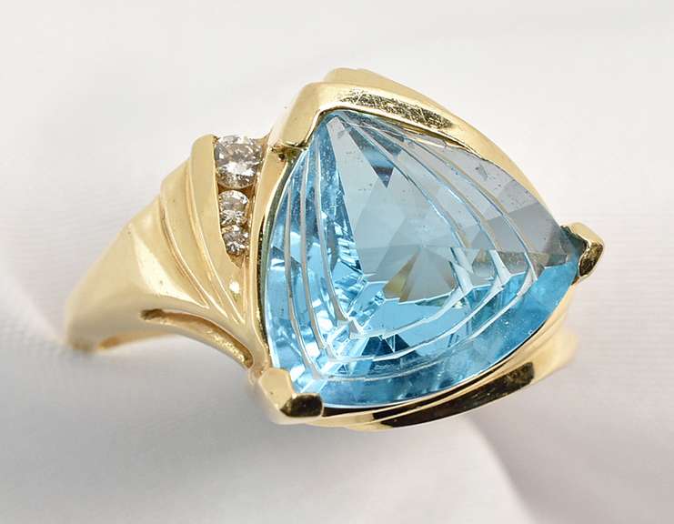 Contemporary Trillion Cut Blue Topaz Ring