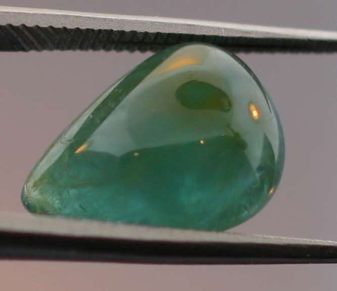 Eye catching 3.24ct forest green Grandidierite cabochon