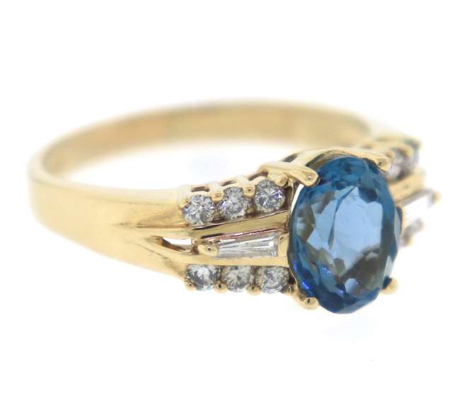 Charming Blue Topaz and Diamond Yellow Gold Ring
