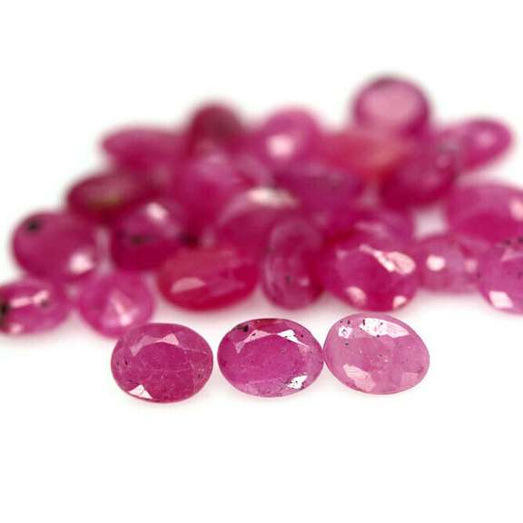 Heated only! 5.75ct violet red Ruby set