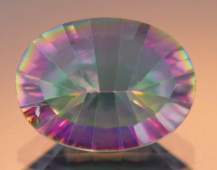Concave cut 7.51ct rainbow Mystic Quartz