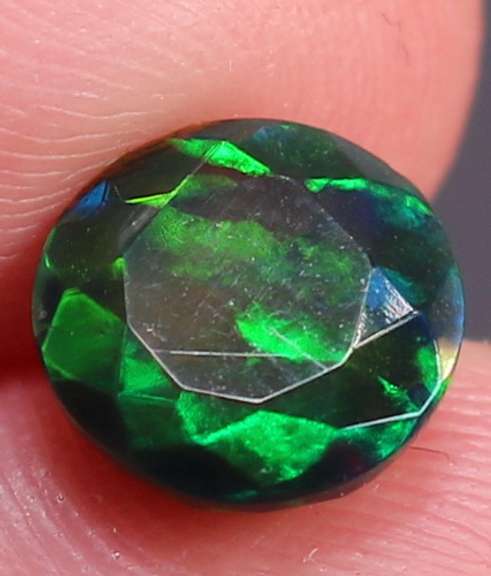 Vibrant 1.55ct ribbon pattern Black Opal solitaire