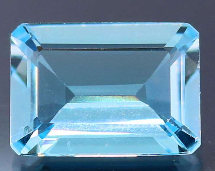 Very clean 10x14mm 7.52ct emerald cut Topaz