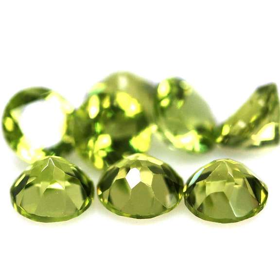 Fantastic 3.27ct 4.5mm round brilliant cut Peridot set