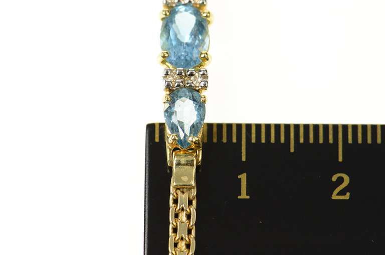 14K Yellow Gold Three Stone Blue Topaz Diamond Bar Link Bracelet