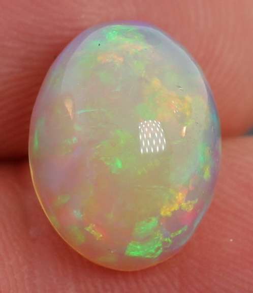 Stunning 4.63ct floral patterned semi-black Opal