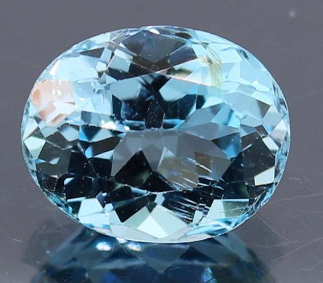 Simply stunning 6.36ct 10x12mm vivid sky blue Topaz
