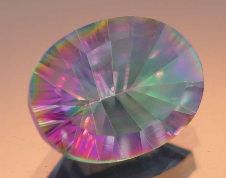 Concave cut 7.51ct rainbow Mystic Quartz
