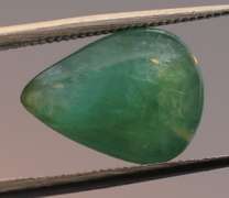 Eye catching 3.24ct forest green Grandidierite cabochon