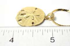 Detailed Sand Dollar Necklace in 14KT Yellow Gold