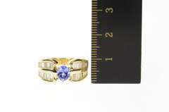 14K Yellow Gold 1.60 Ctw Oval Tanzanite Baguette Diamond Ring
