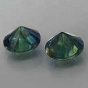 Unheated! .98ct diamond cut blue green Sapphire set