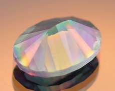 Concave cut 7.51ct rainbow Mystic Quartz