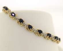 Stunning Blue Sapphire and Diamond Flower Tennis Bracelet
